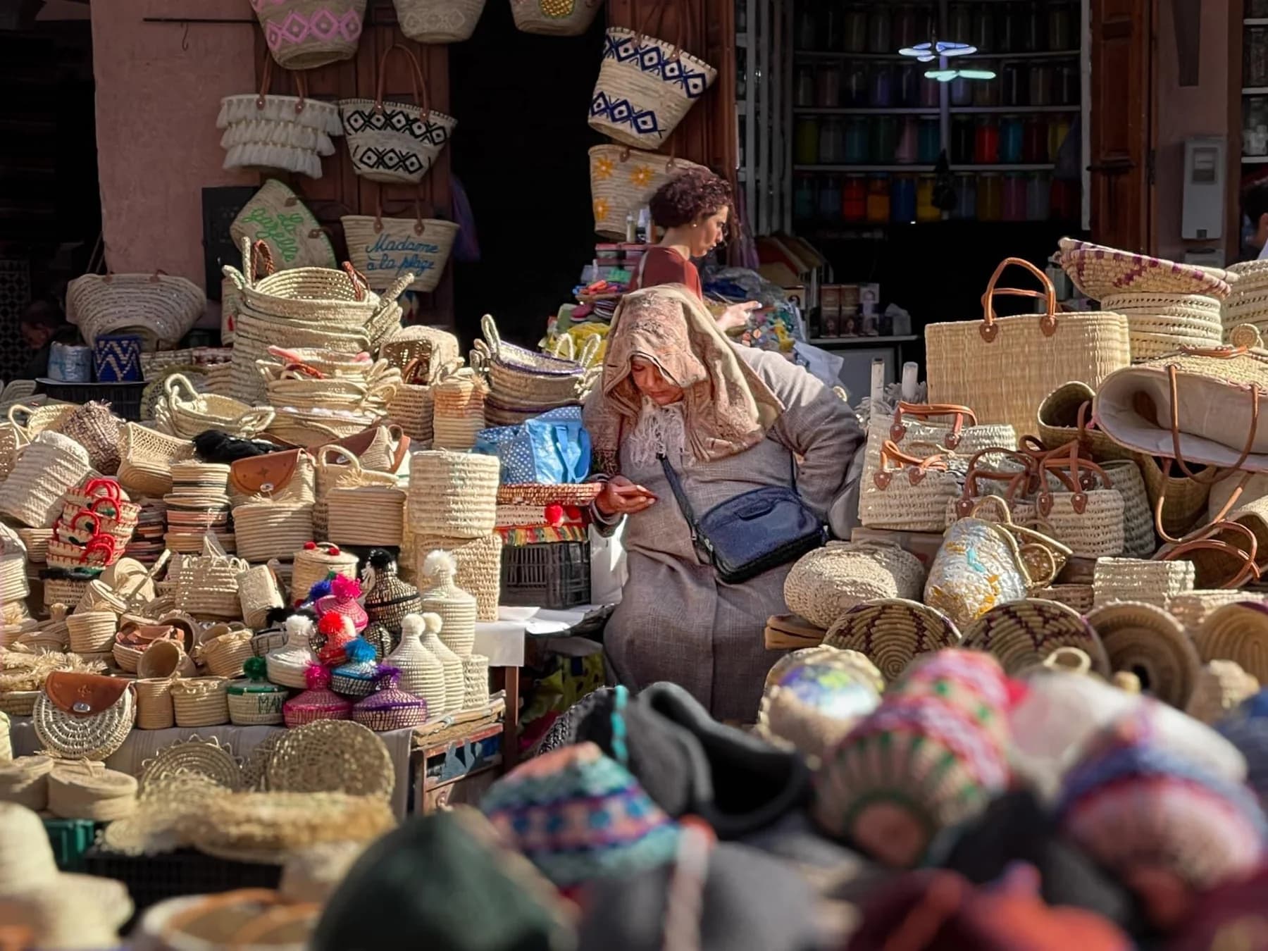 Woven baskets and craft goods at a Marrakech souk stall